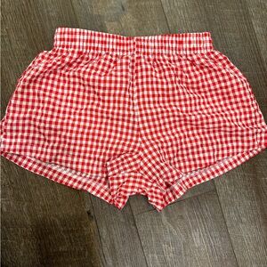 Princess Polly checkered red and white shorts